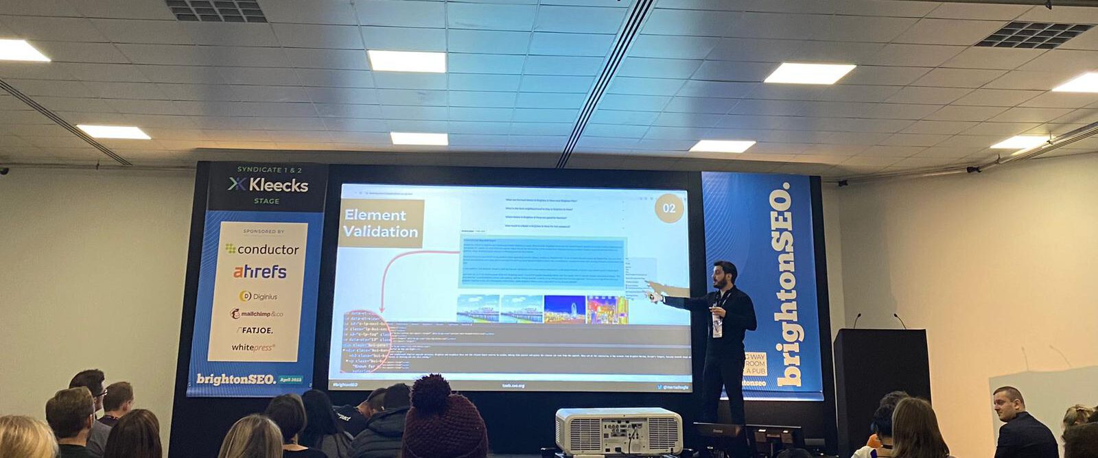 Mert Azizoglu speaking at Brighton SEO